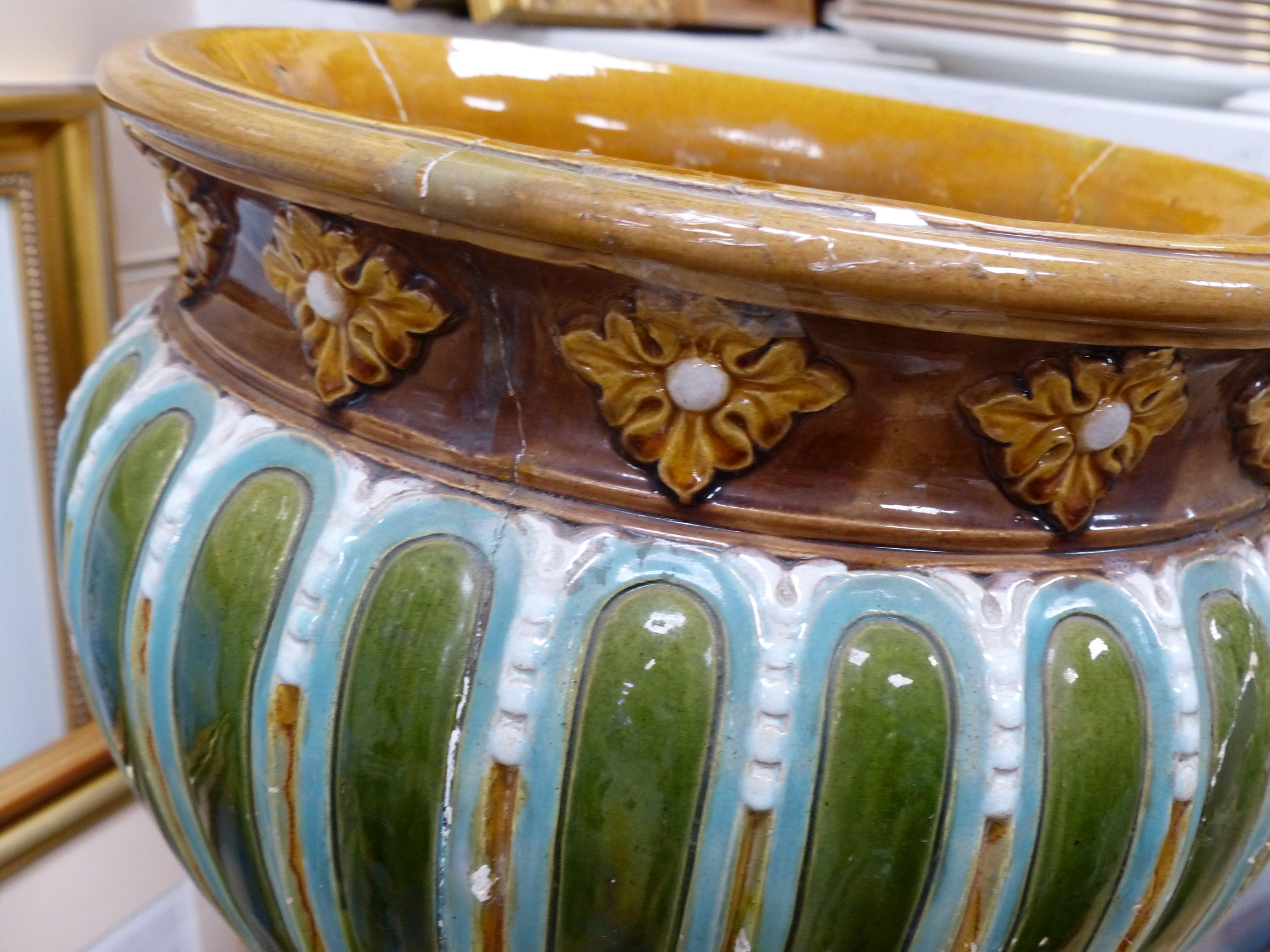 A Doulton Lambeth jardiniere on stand, overall height 92cm (a.f.), the stand apparently unmarked